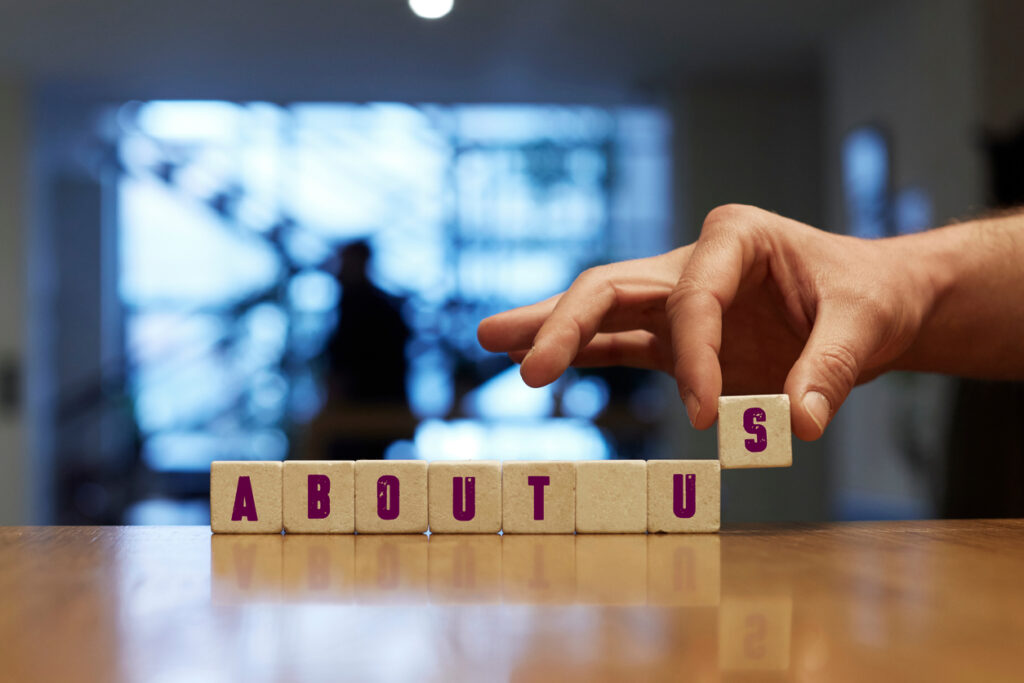 about us concept with alphabet blocks